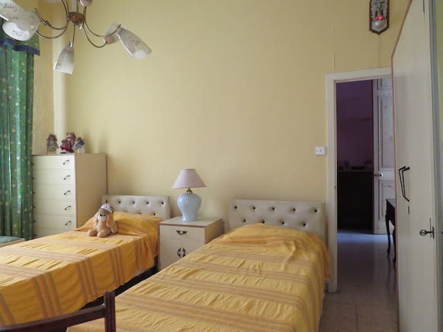 2 beds, bedroom in the heart of the Capital City.