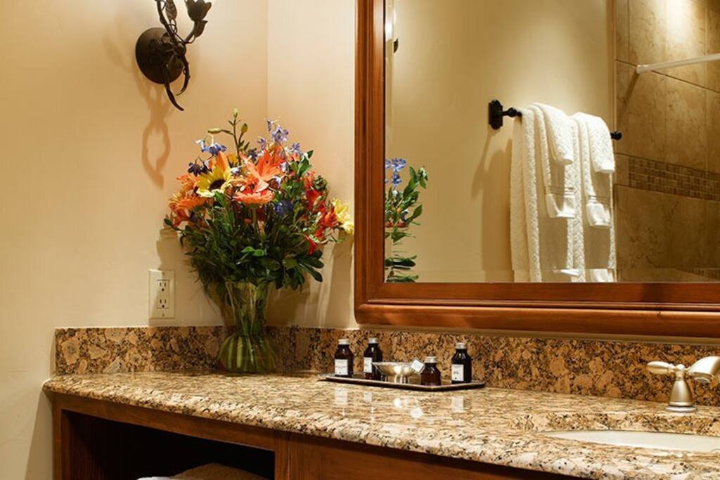 Get ready for your day in the pristine bathroom.