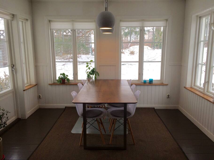 Kitchen with large sitting area opening to outside deck