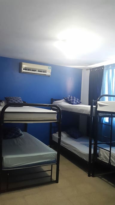 Aire acondicionado, baño privado,tv por cable, wifi,agua caliente, closet X cama con sistema de candado