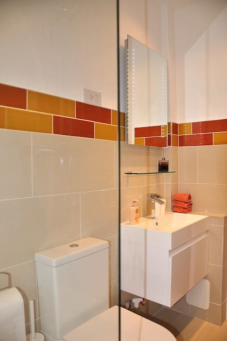 Bathroom with modern vanity unit
