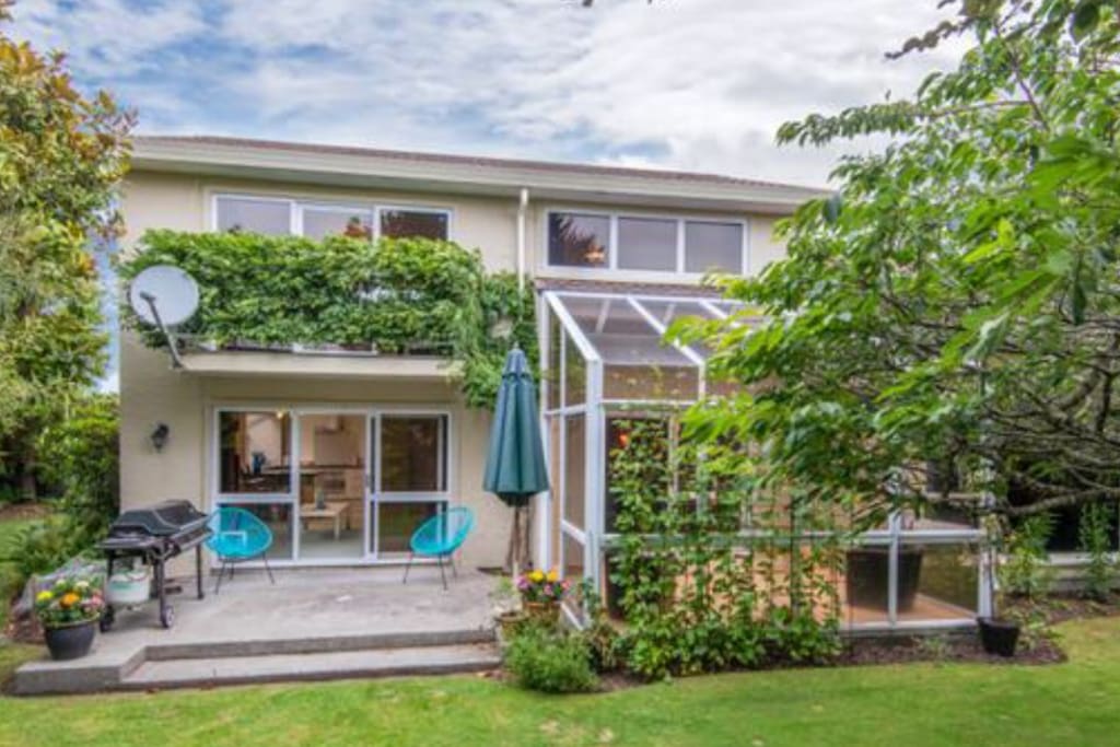 Front section of house with safe enclosed garden ( run around area with swing for children ). YOUR lounge situated right of the conservatory.