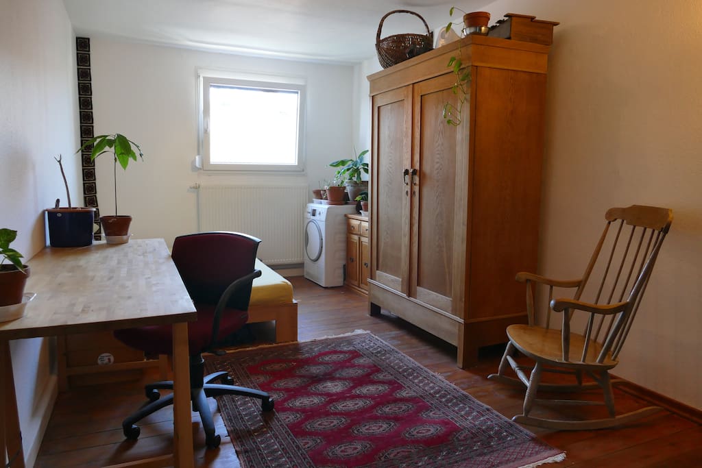 Our guestroom - with a desk space and plenty of light.