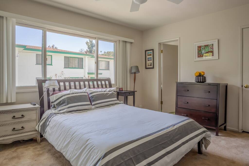 Comfortable Queen Bed in the Master Bedroom with En Suite 1/2 Bathroom