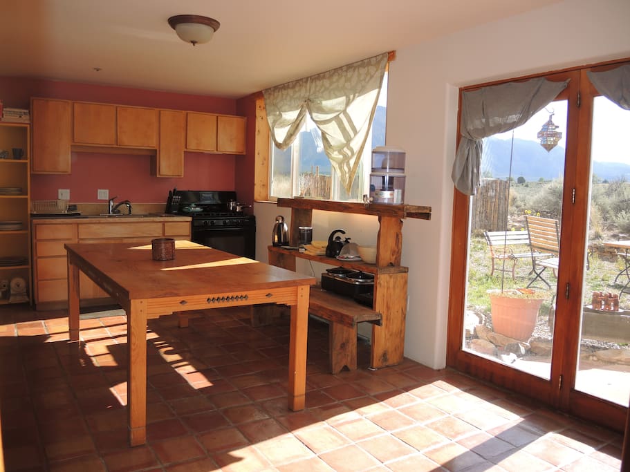 Kitchenette and wooden dining table