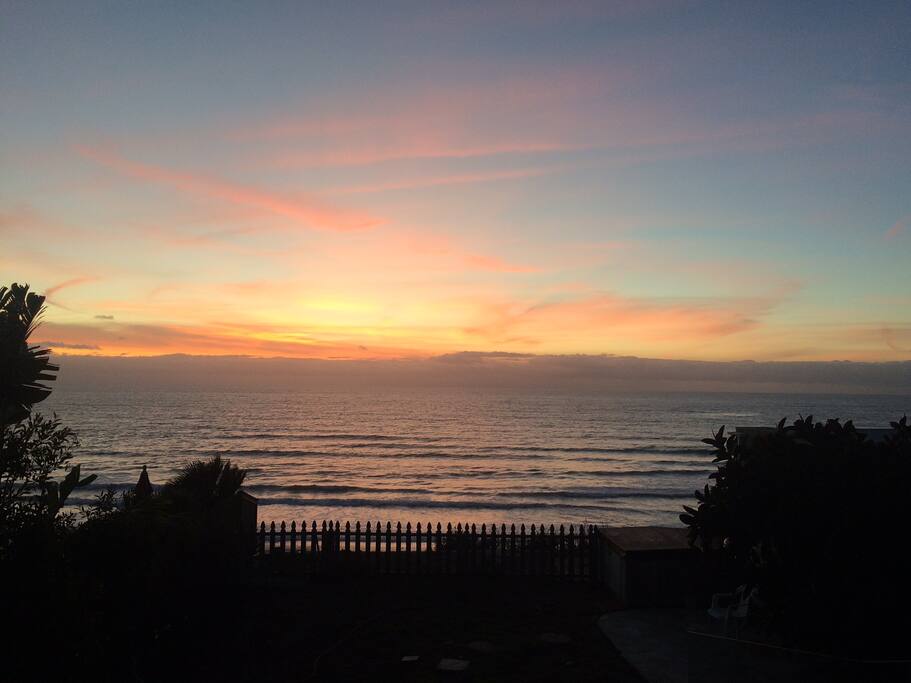 Enjoy a glass of wine at sunset.