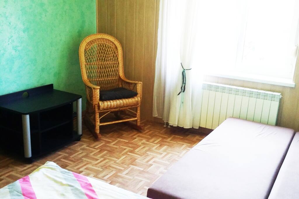 In the bedroom, there is also a comfy chair where you can relax, read a book or anything you want!