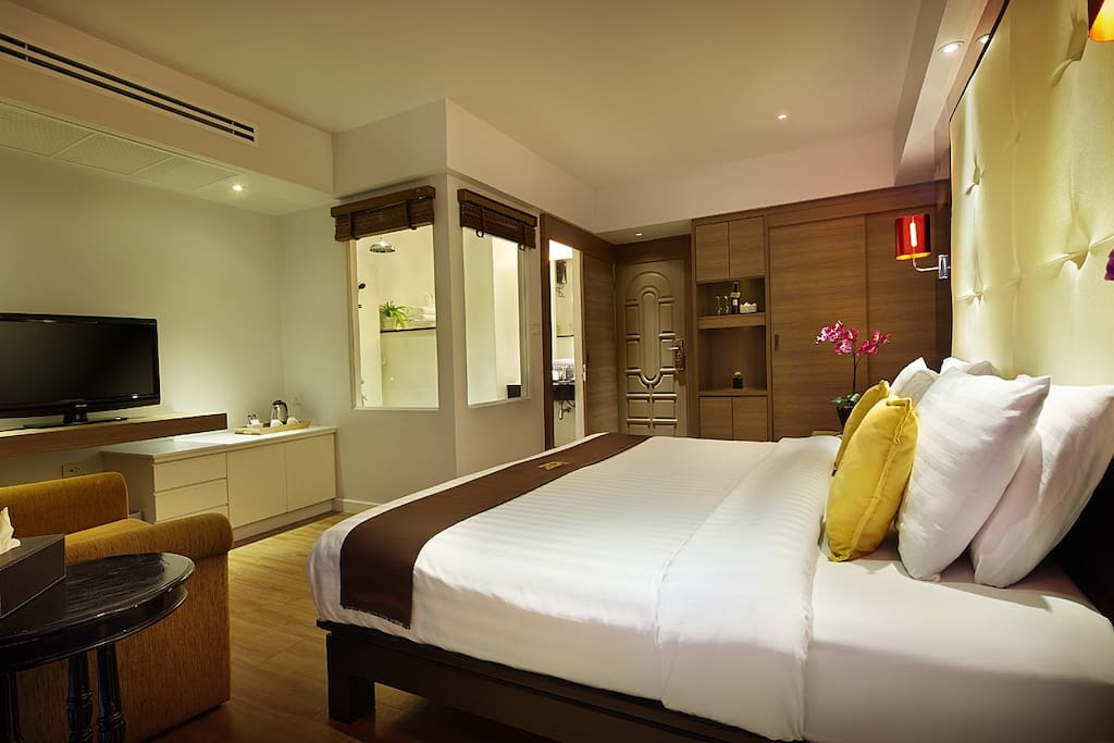 Cute Room (2) just perfect for quiet holiday away from home with private rain shower, sofa, cable TV.