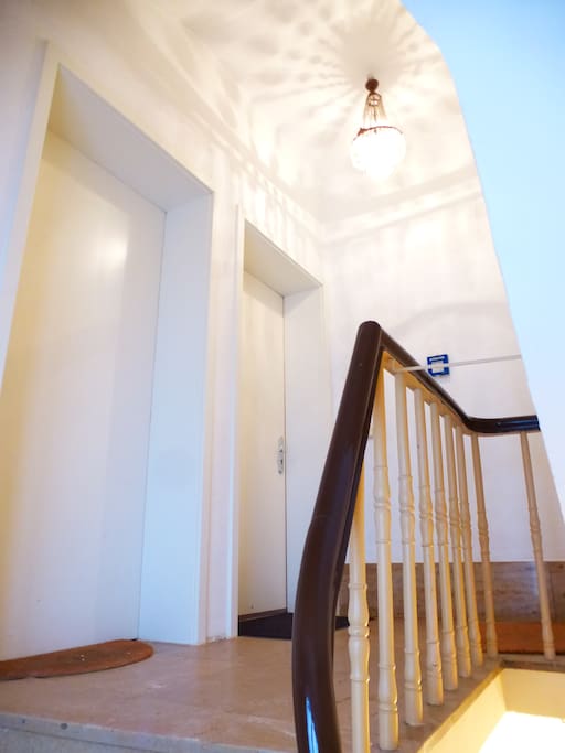 The left door leads to the apartment
