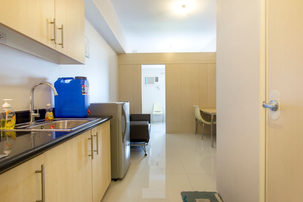 Kitchen, dining room leading to the bedroom