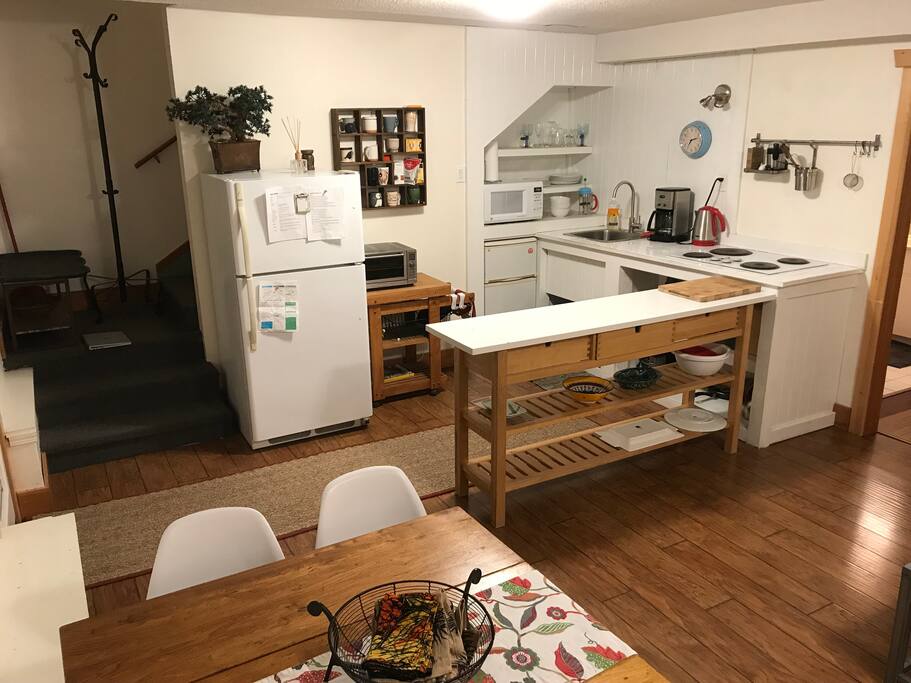 Kitchen with 4 burner cast iron cook top