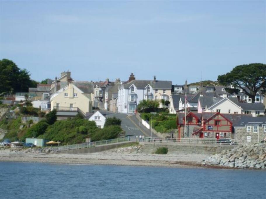 That's us, the lilac building, so close to the beach.