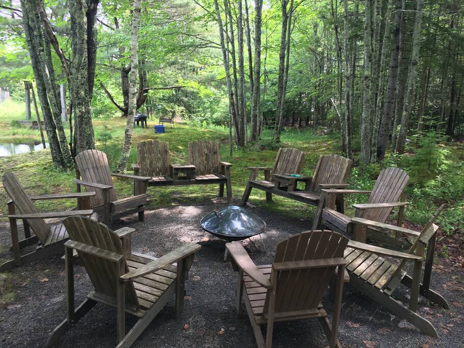 The fire pit area by the pond on our property