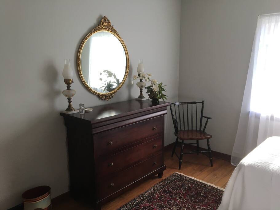 Generous dresser, matching Hitchcock chair in first floor bedroom.
