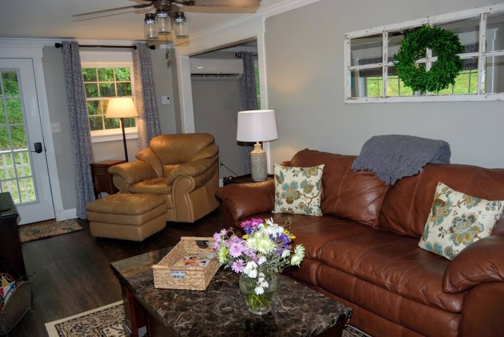 Living room area and private entrance to the guest suite.
