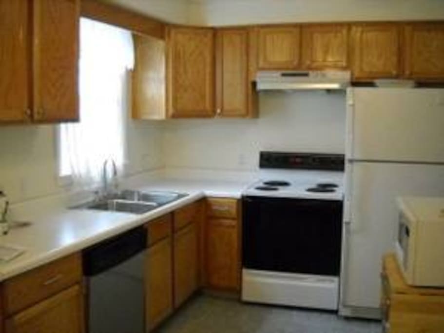 Nice sized kitchen with everything you need to cook and consume.