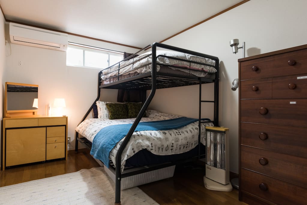 Bedroom - double bed and single top bunk.