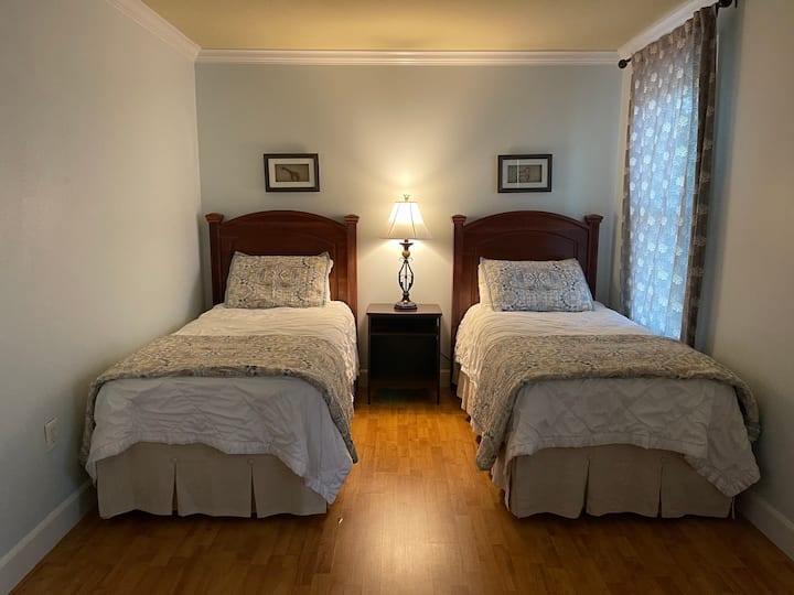 This bedroom has a full bath and a full closet.