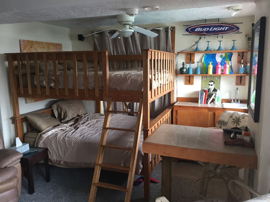 Custom maple queen size bunk bed is comfortable for four adults.