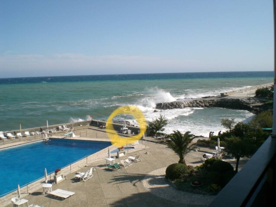private: 2 sunbeds,1 table and beach umbrella