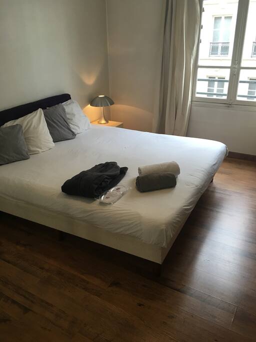 Bedroom with a comfortable king size bed, a spacious wardrobe for your clothes.