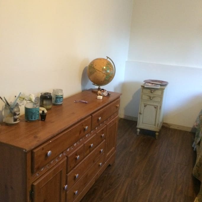 armoire in bedroom; large bedroom.