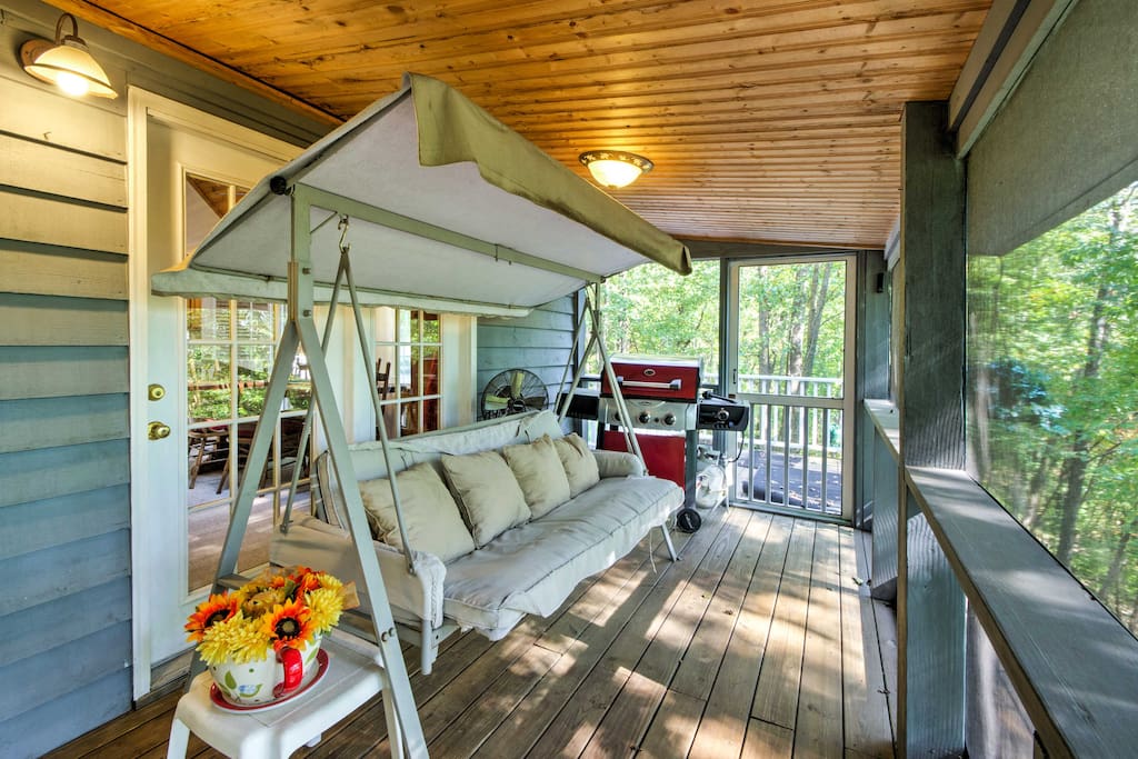This home for 7 offers many spots to relax and enjoy the woodland views.