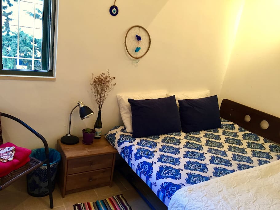 Double bed, lovely natural light, and LOTS of closet space.