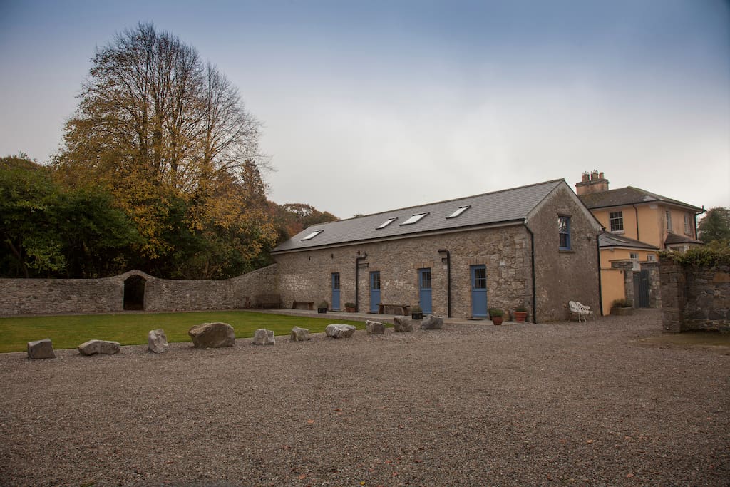 The beloved stone coachhouse at Hotwell, builtin 1838 and restored in 2017 to boutique luxury. Each room is ensuite with, smart bathroom, a superking sized bed and its own private entrance onto the sunny courtyard - through a cute stable door.