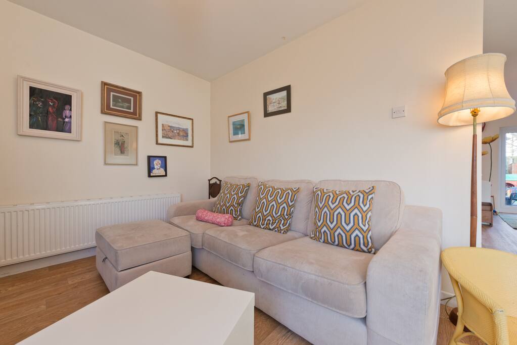Large comfortable counch for relaxing after a hard day of sight-seeing. Faces onto large flat screen TV.