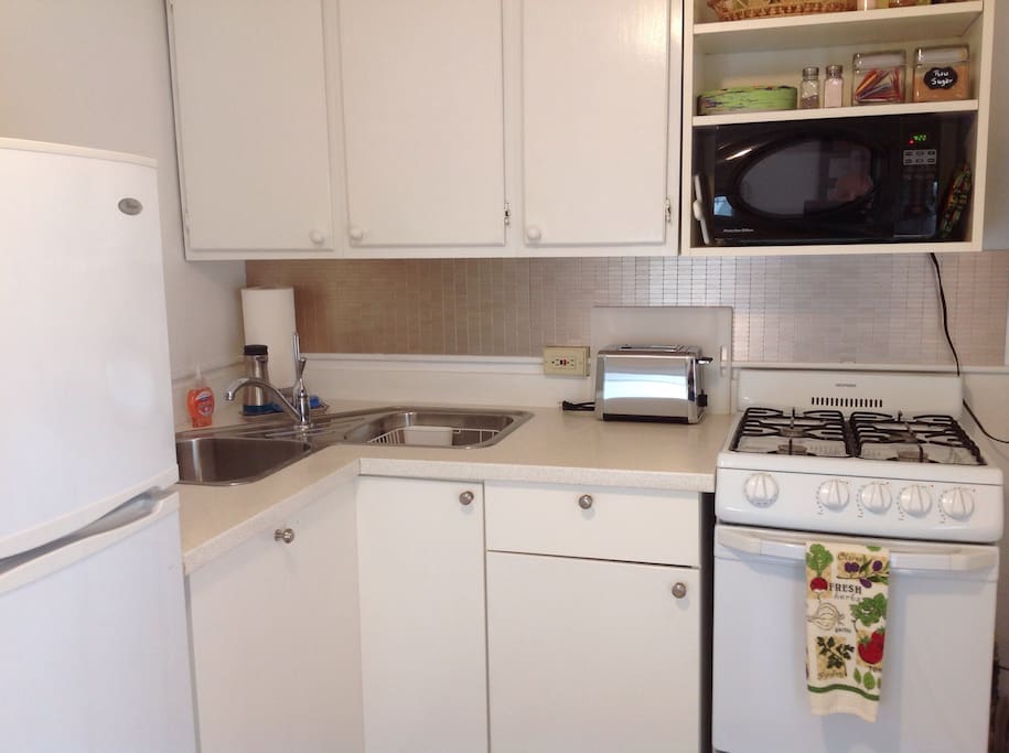 Full kitchen with coffee maker toaster and all other essentials