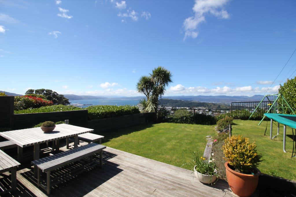 Spacious garden with BBQ and outdoor dining.
