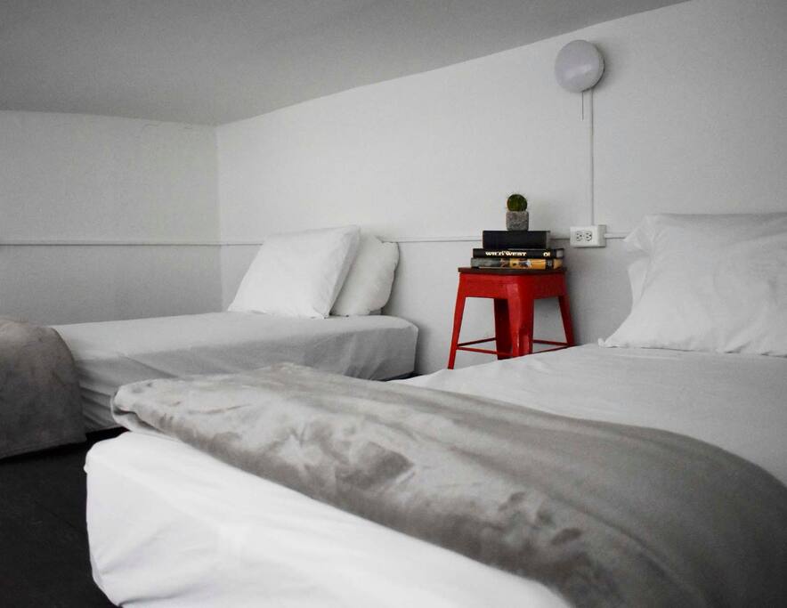 Upstairs, two Twin-sized beds complete the space