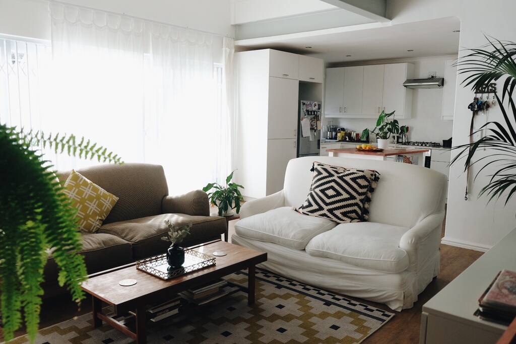 Living room and doors to courtyard