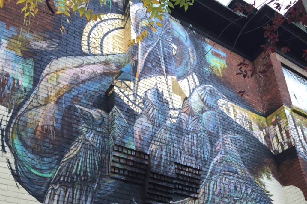 Giant Mural on side of the Art House Airbnb - done by a local tattoo artist