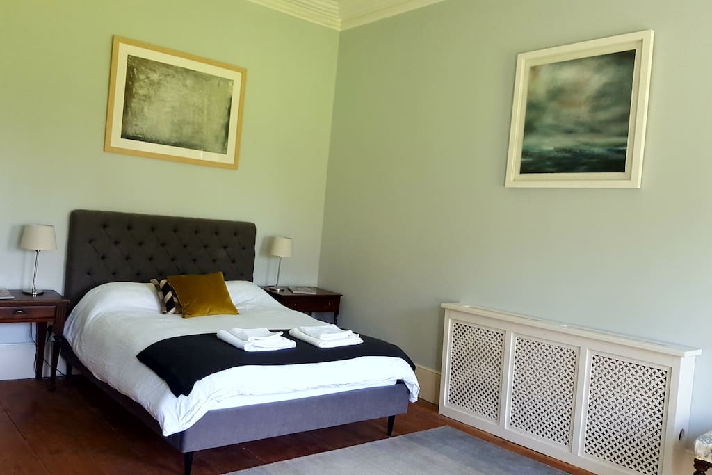 Bedroom 1 - 1 King size bed. A bright, spacious room with original coving, high ceilings and a marble fireplace