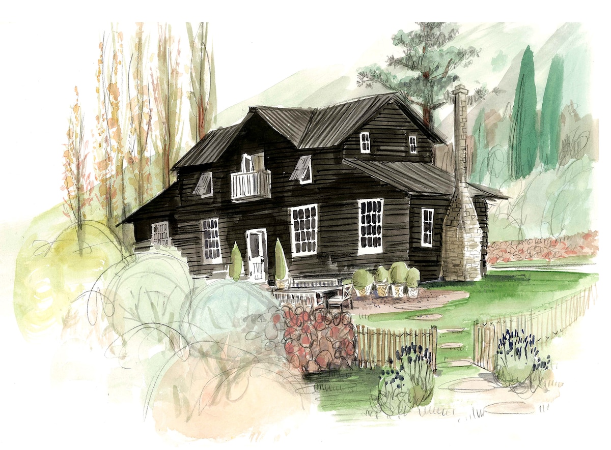 An artistic rendering depicts a charming barn-style structure with dark wooden exterior. Surrounding greenery, including trees and colorful shrubs, enhances the setting. A spacious porch is featured, along with large windows, allowing ample natural light. A well-maintained garden is visible in the foreground.