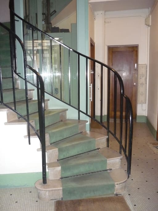 Lobby with stairs and elevator