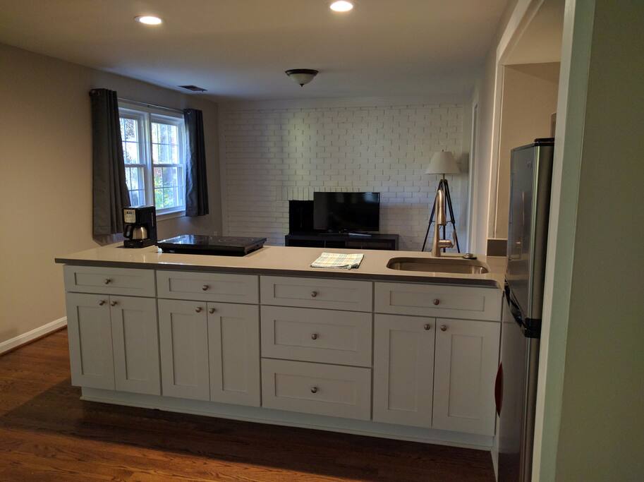 Kitchenette - small coffee maker, hotplate, toaster oven, microwave, refrigerator/freezer.