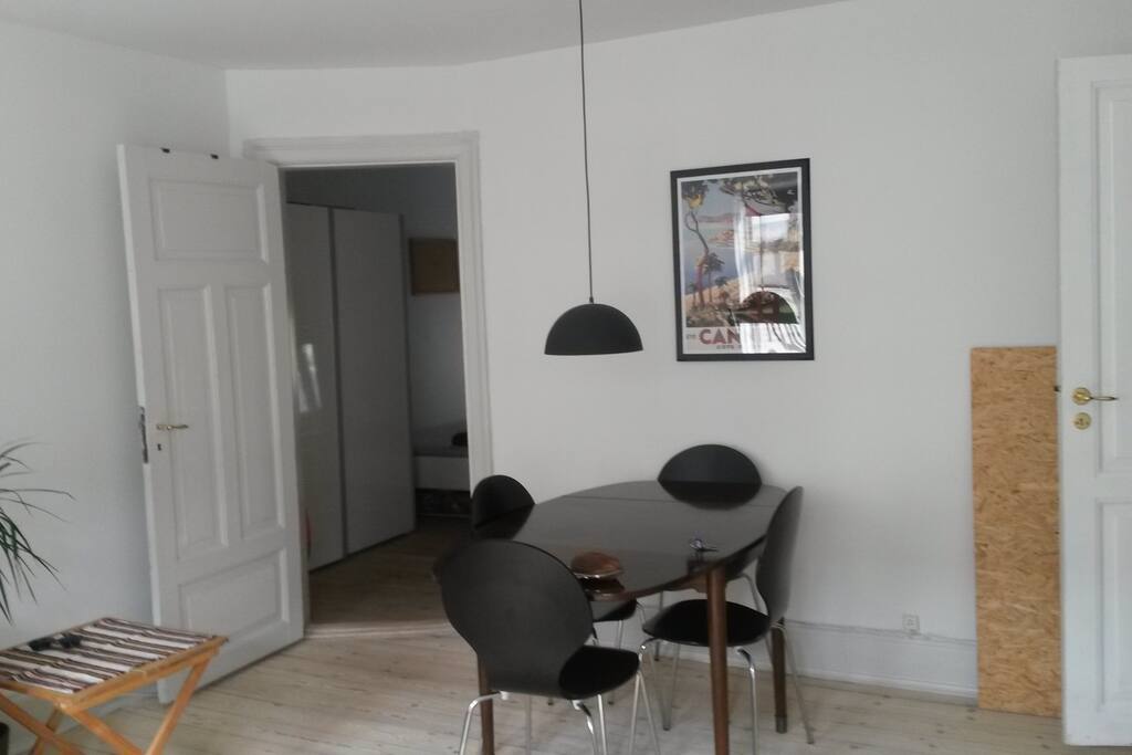 Livingroom and private entrance to bedroom