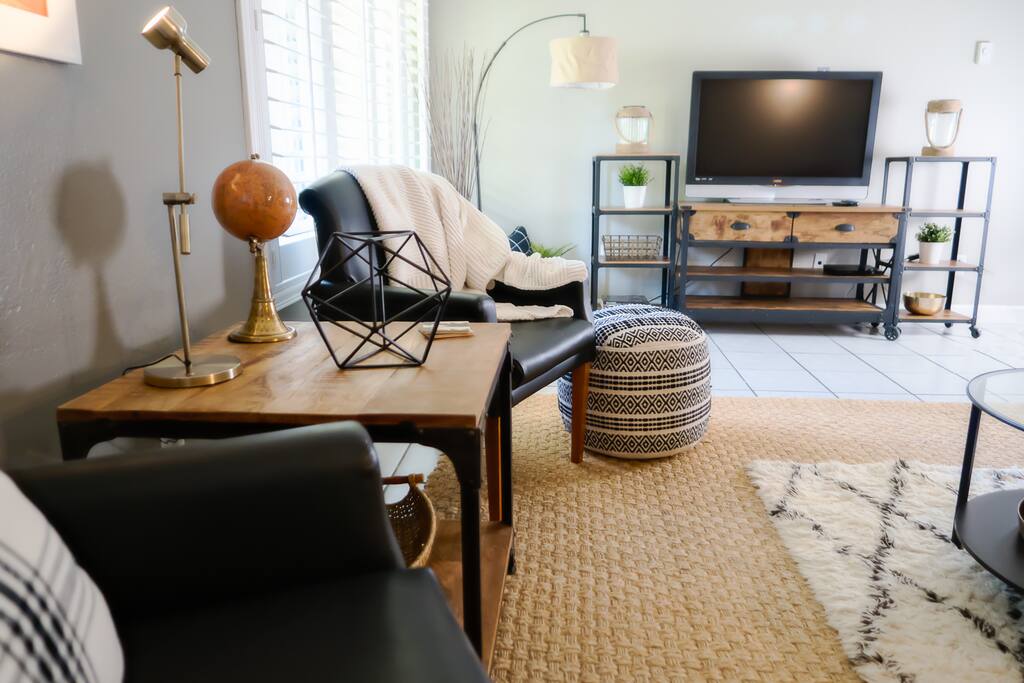 Kick back and watch some tv in the living room.