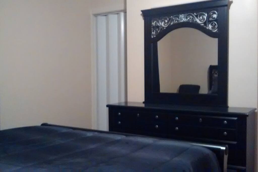 Bedroom #2b - small walk-in closet and plenty of drawer space in dresser.
