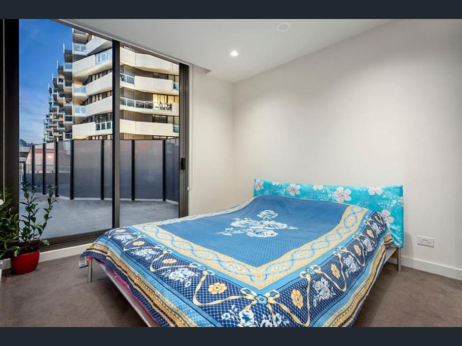 large bedroom with nice views