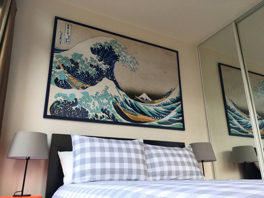 Another angle of the bedroom. Artwork is ace.