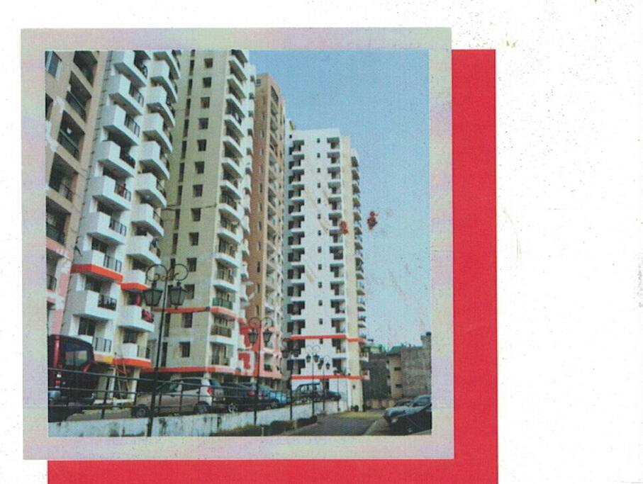 "Sunrise Tower Nakhkhu, Lalitpur, where the apartment is located"