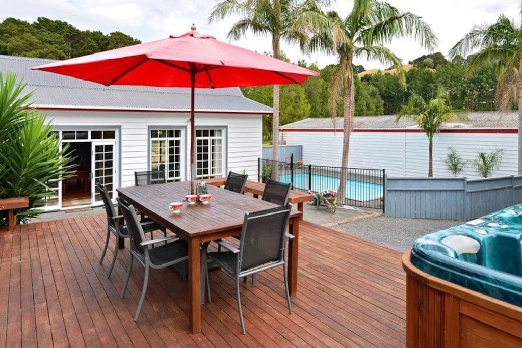 Outdoor entertaining area, off the dining room, overlooking pool and driveway