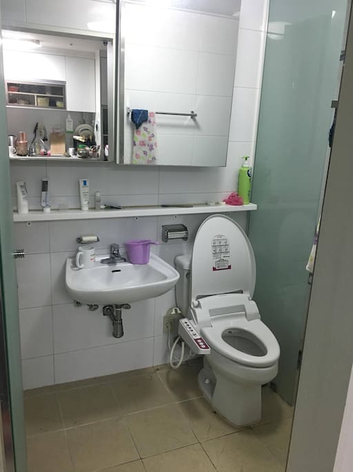 Common shower shared bathroom with a modern bidet. Always available for hot water shower.