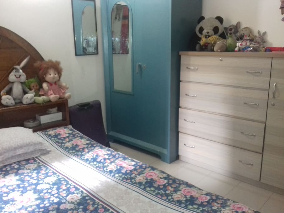 Angle view of bedroom and the closets.