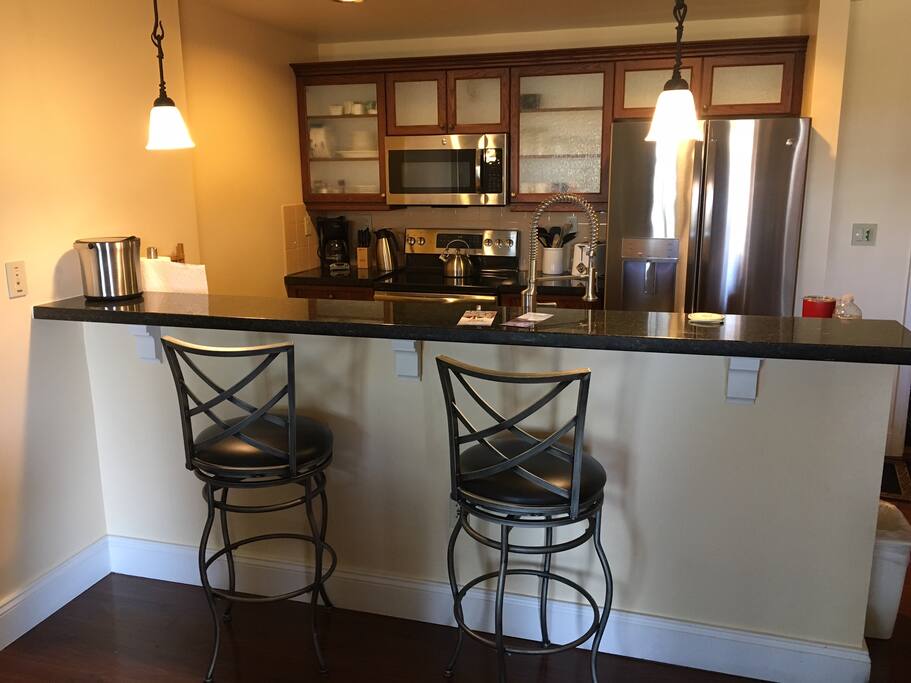 Convenient breakfast bar in open concept great room.