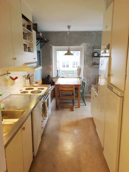 Our large kitchen can easy accomodate 6-8 people.